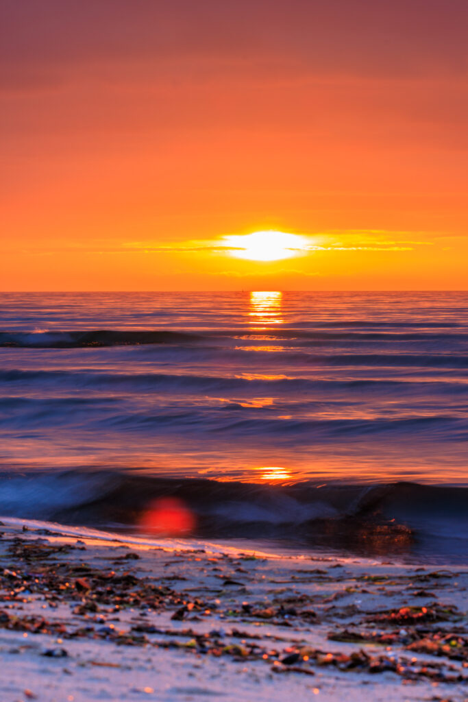 Sonnenuntergang am Strand von Warnemünde